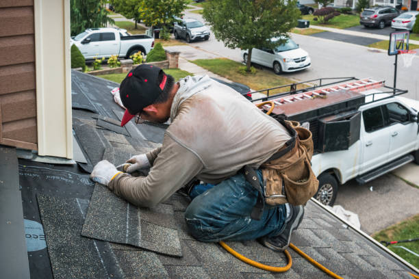 Professional Roof Replacement technician working in Dumont, NJ